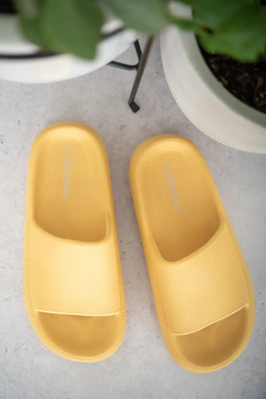 Yellow Slide-On Sandals.